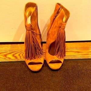 BRAND new pair of Christian Loubiton